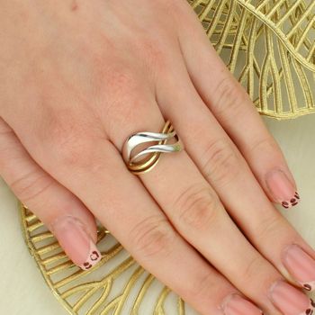 Złoty pierścionek damski 333 z falistymi obręczami – białe i żółte złoto Au.jpg